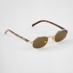 Sunglasses with the iconic metal plaque